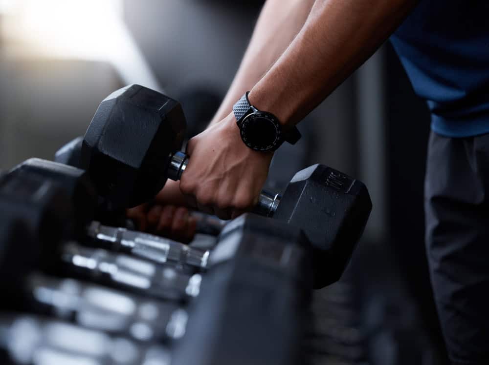 Fitness,,Dumbbell,And,Hands,Of,Man,At,Gym,With,Smart